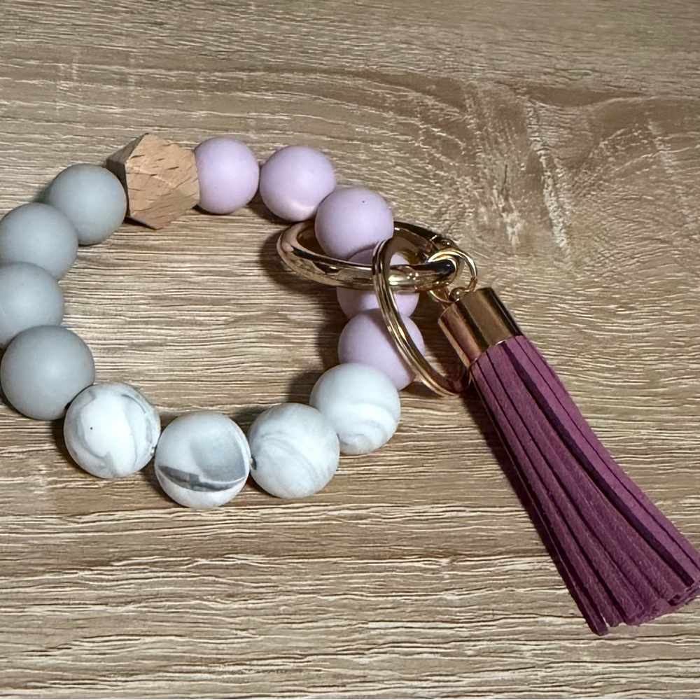 Elegant Gray and Purple Beaded Bracelet with Tassel